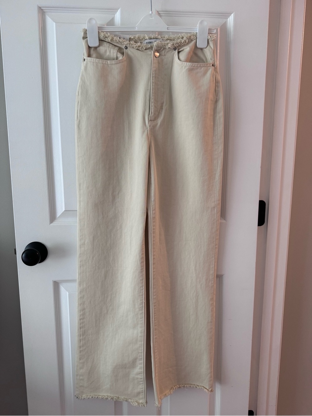 high-rise, wide-leg jeans from the lifestyle brand We Wore What.